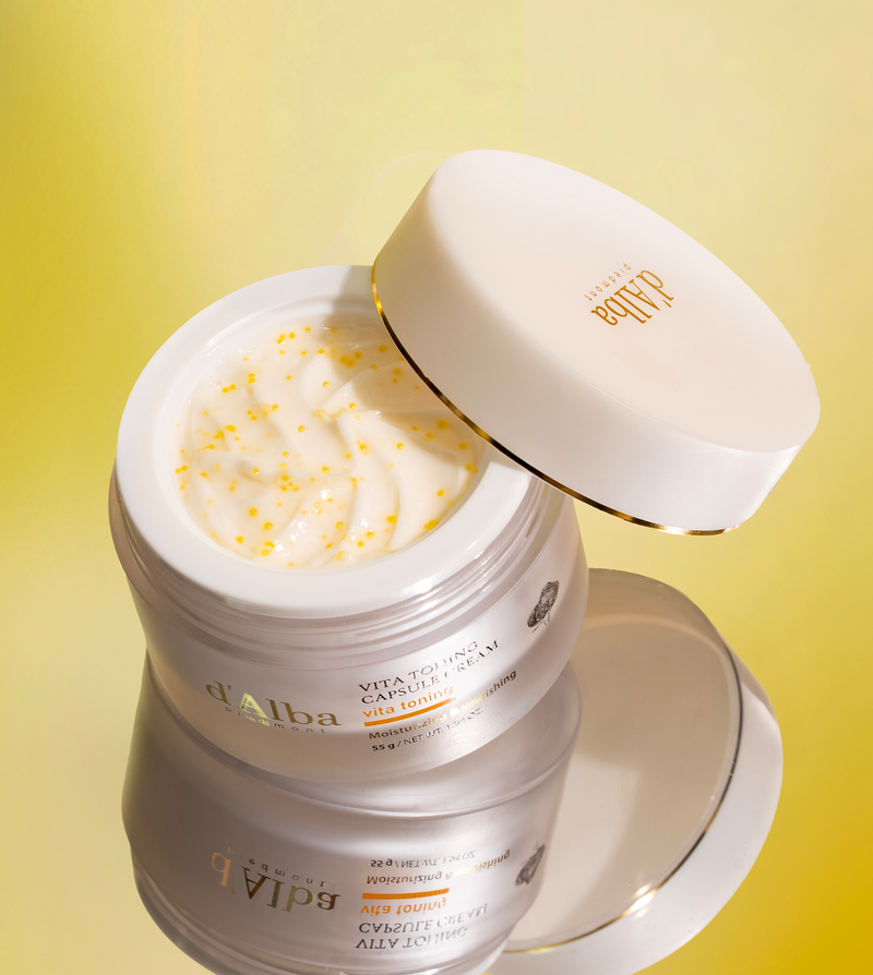 d'Alba Vita Toning Capsule Cream texture with vitamin oil capsules